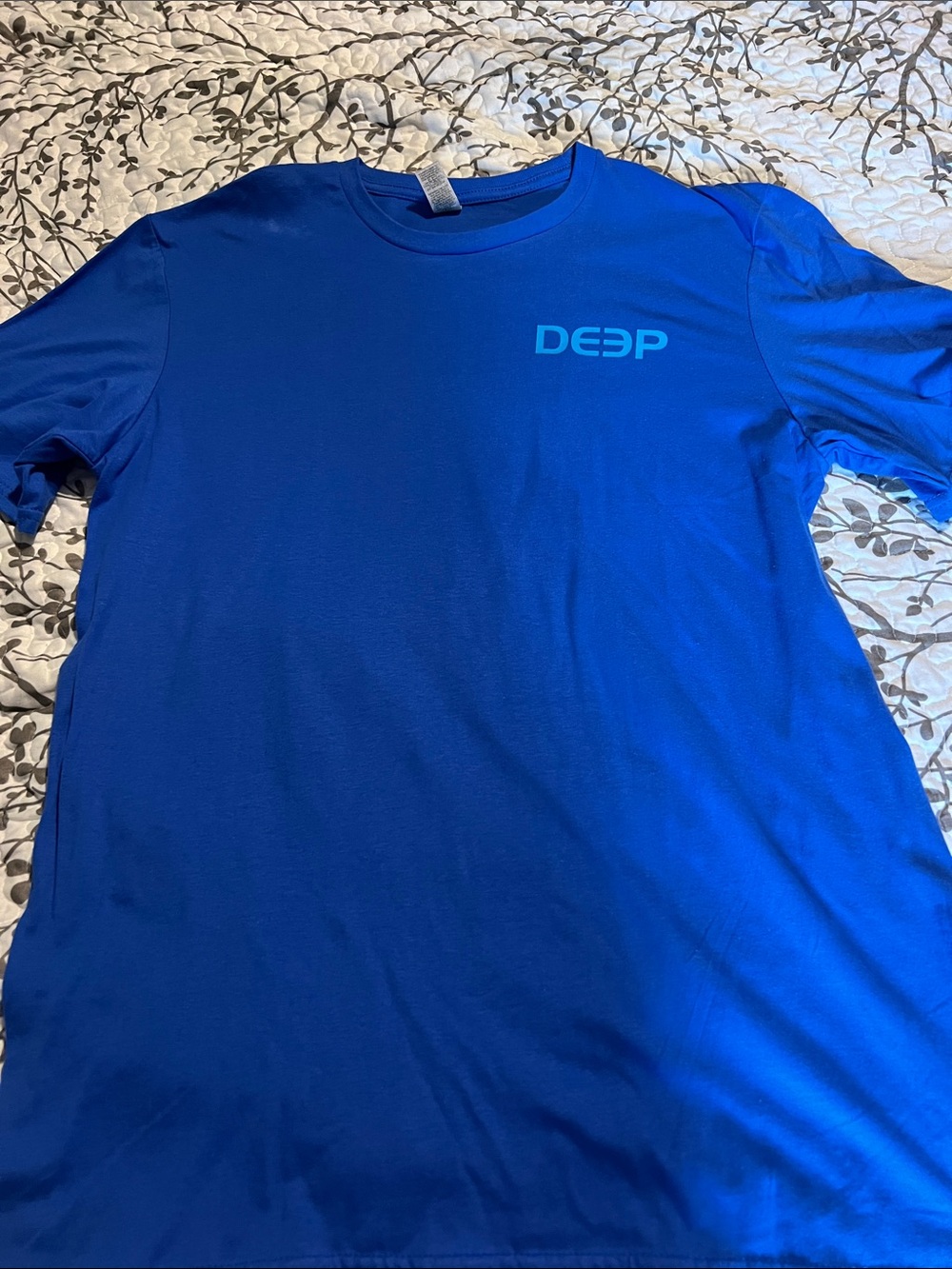 Like new never worn Deep T-shirt